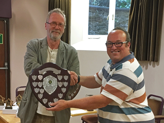 Andrew Kinder presents the Division 3 trophy to Ben Wilkinson the South Hams Division 3 team captain