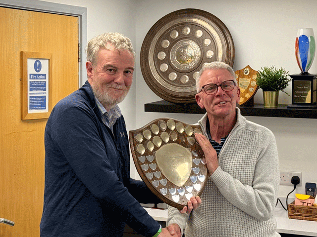 Paul Brooks presented the Division 1 trophy to Chris Collins representing Totnes