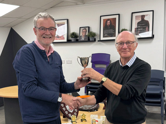 Newton Abbot's trophy haul included the White Knight Chemicals Knockout Cup, presented here to Trefor Thynne